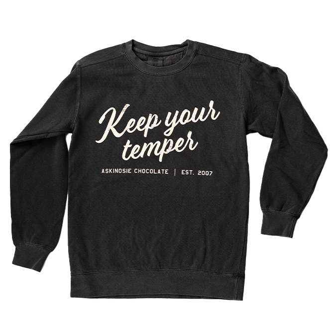 Dark grey sweatshirt with white text 'Keep your temper' on a white background